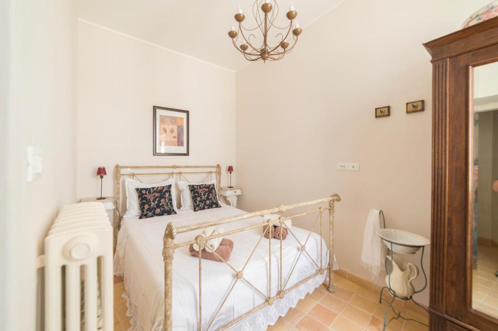 Postel nebo postele na pokoji v ubytování Charmante vakantiewoning 'Casa Di Tonno'