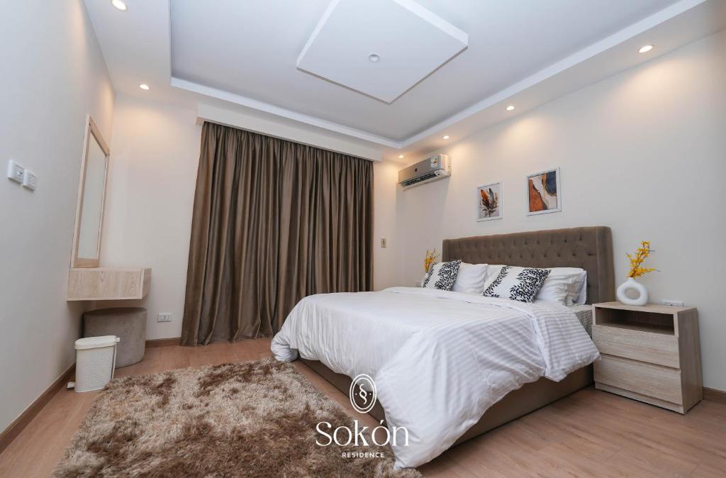 Postel nebo postele na pokoji v ubytování Sokón Residence ,Cairo ,New Cairo,Madinaty,B6,U02