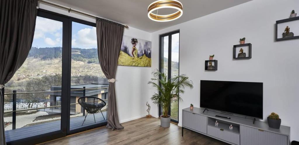 TV a/nebo společenská místnost v ubytování Blissful Resort - Valea Doftanei