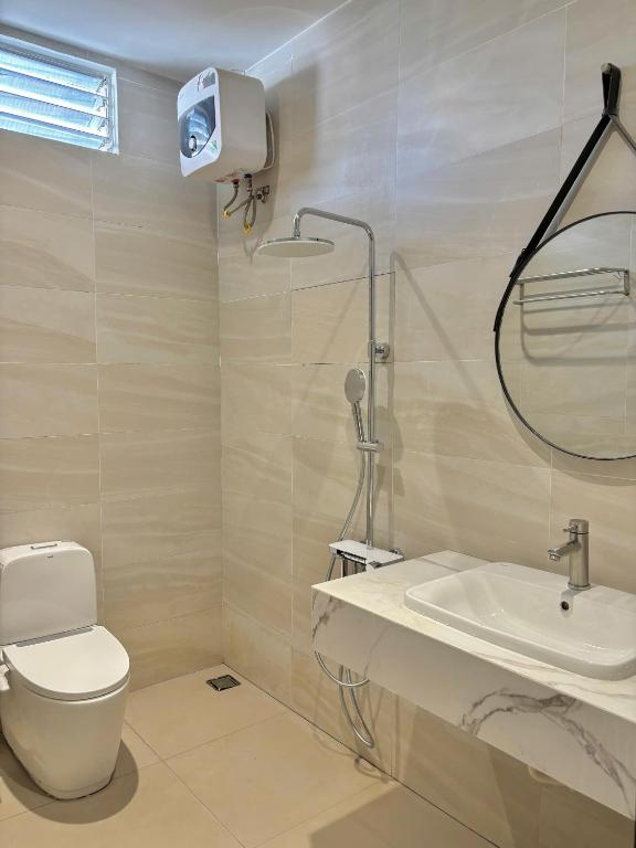 Koupelna v ubytování POTA Hotel & Apartment