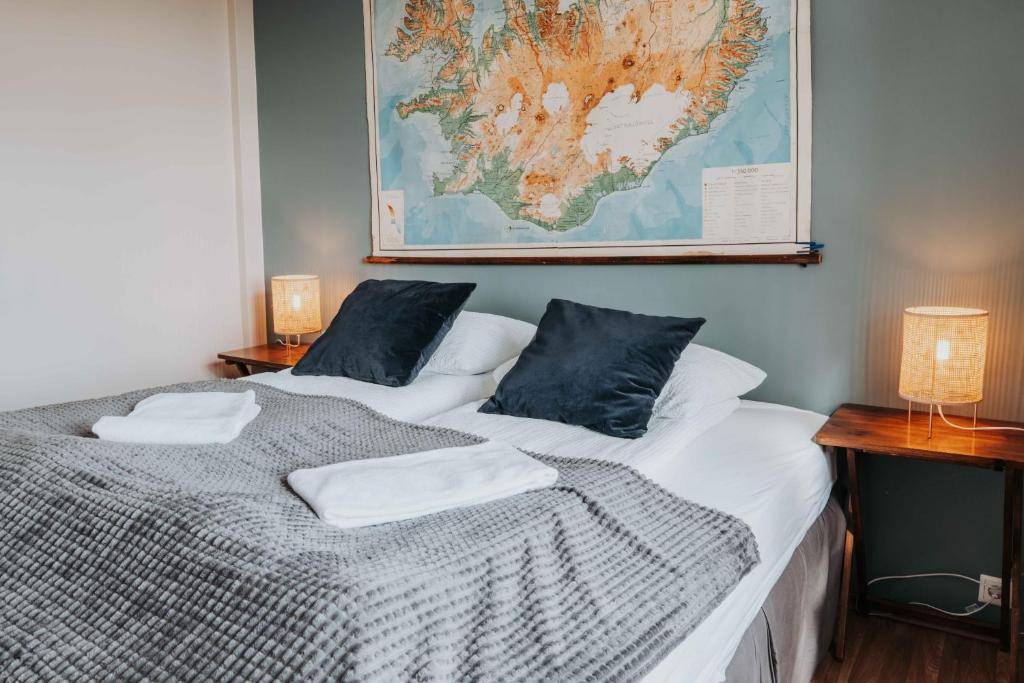 Voodi või voodid majutusasutuse Héradsskólinn Historic Guesthouse toas