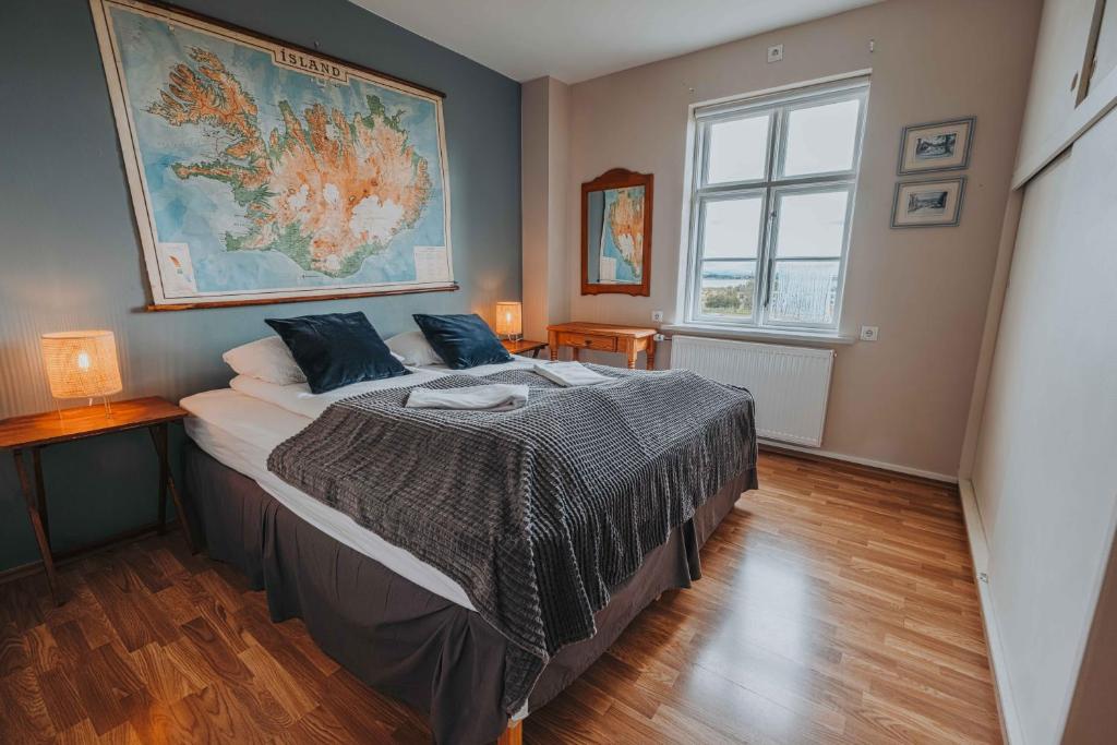 Voodi või voodid majutusasutuse Héradsskólinn Historic Guesthouse toas