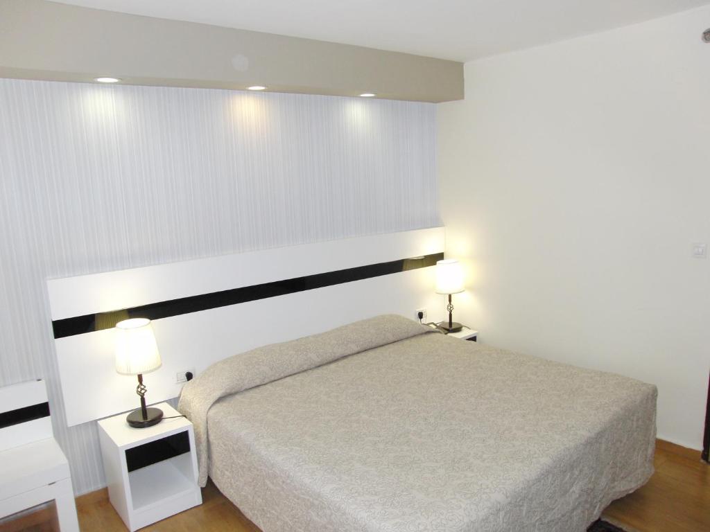 Postel nebo postele na pokoji v ubytování Margoa Hotel Netanya