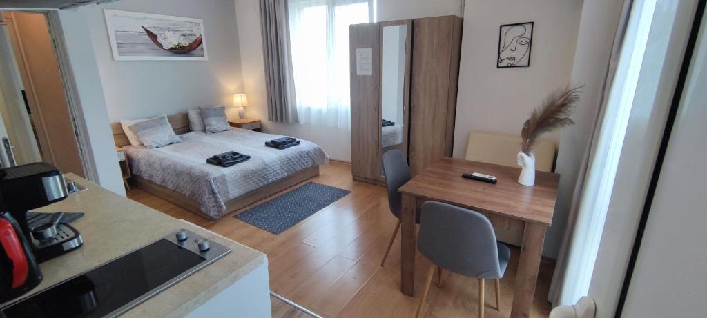 Postel nebo postele na pokoji v ubytování Benita Inn apartments