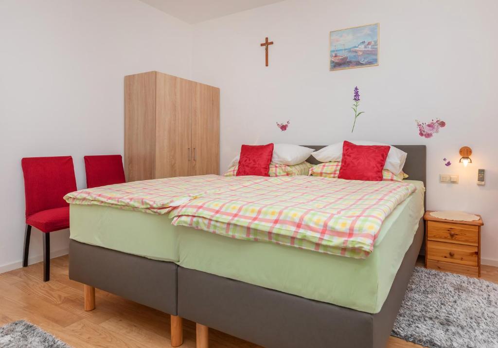 Кровать или кровати в номере Apartmani Galić 2