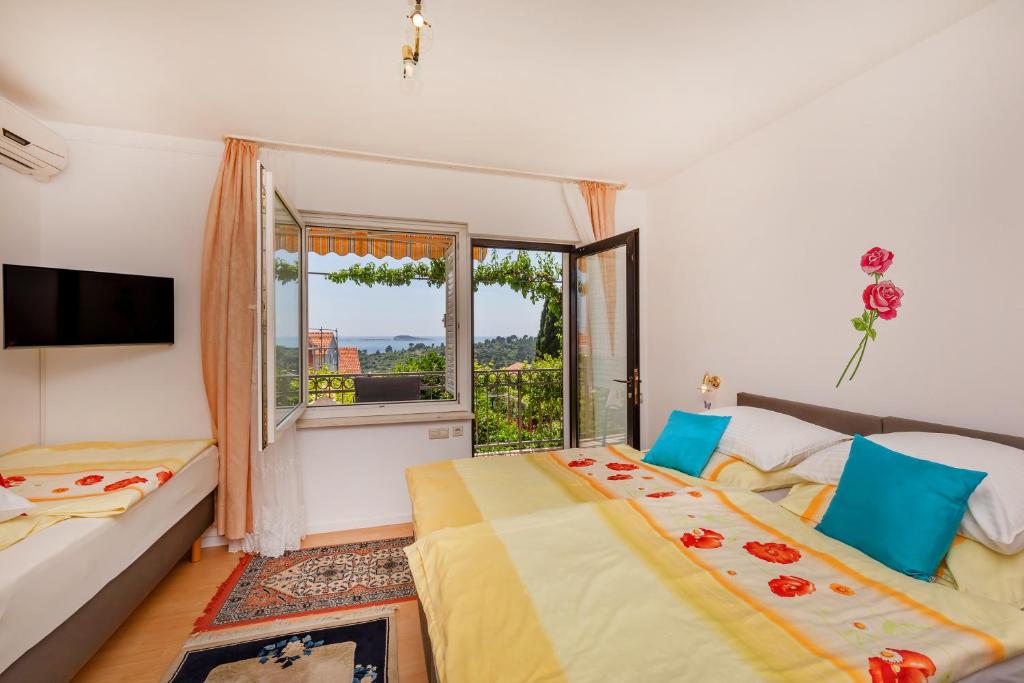 Кровать или кровати в номере Apartmani Galić 2