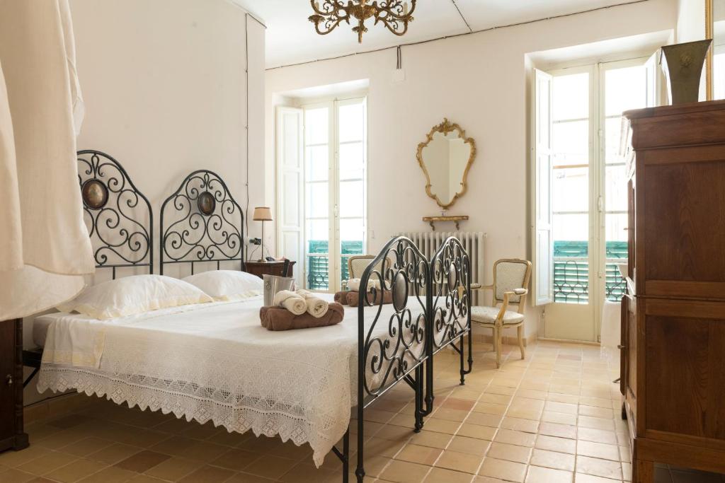 Postel nebo postele na pokoji v ubytování Charmante vakantiewoning 'Casa Di Tonno'