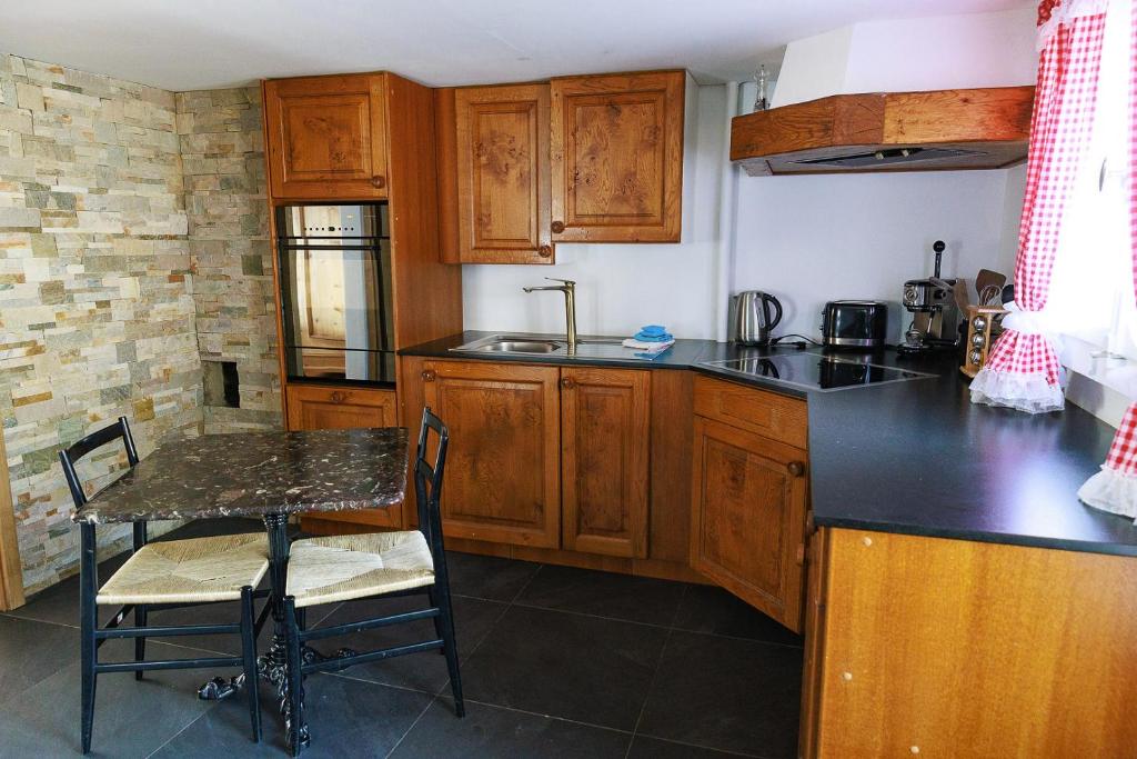 Kuchyň nebo kuchyňský kout v ubytování Charming Alpine Retreat By Apartments Capricorn