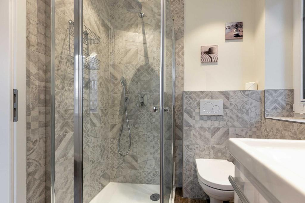 a bathroom with a shower and a toilet at Haus Jensen 3 in List