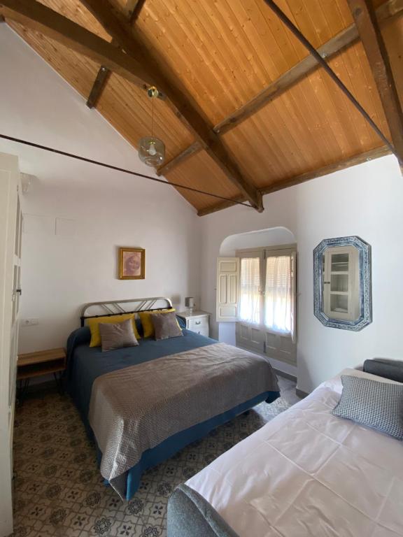 Postel nebo postele na pokoji v ubytování Casa Cordón
