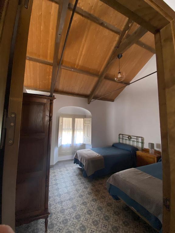 Postel nebo postele na pokoji v ubytování Casa Cordón