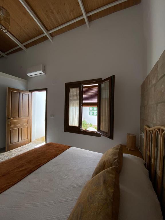 Postel nebo postele na pokoji v ubytování Casa Cordón
