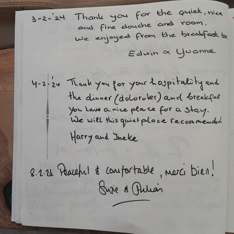 a piece of white paper with handwriting on it at Chambre au coeur des vignes in Myans