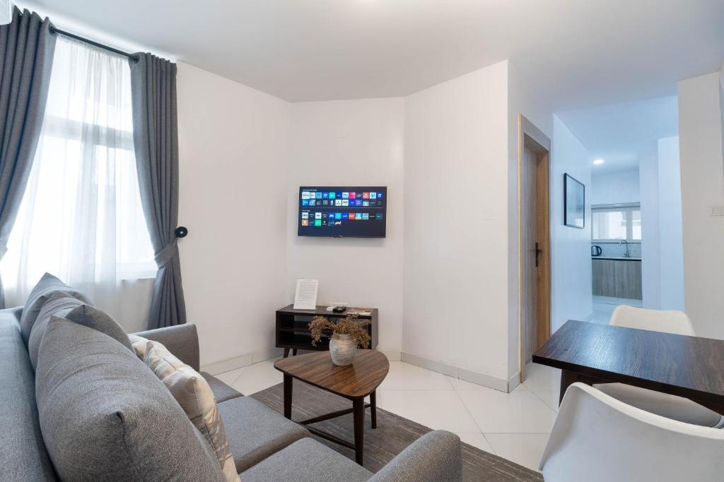 Sigma Base Apartmentsにあるテレビまたはエンターテインメントセンター