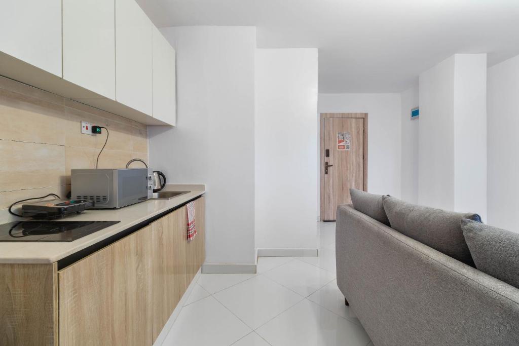 Sigma Base Apartmentsにあるキッチンまたは簡易キッチン