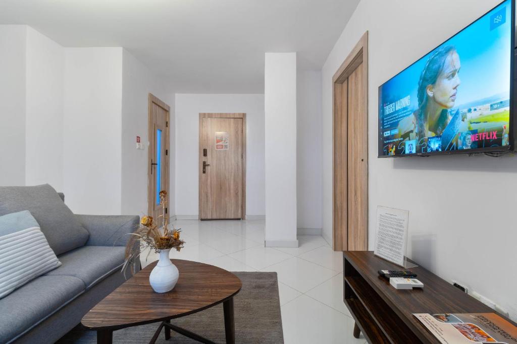Sigma Base Apartmentsにあるテレビまたはエンターテインメントセンター