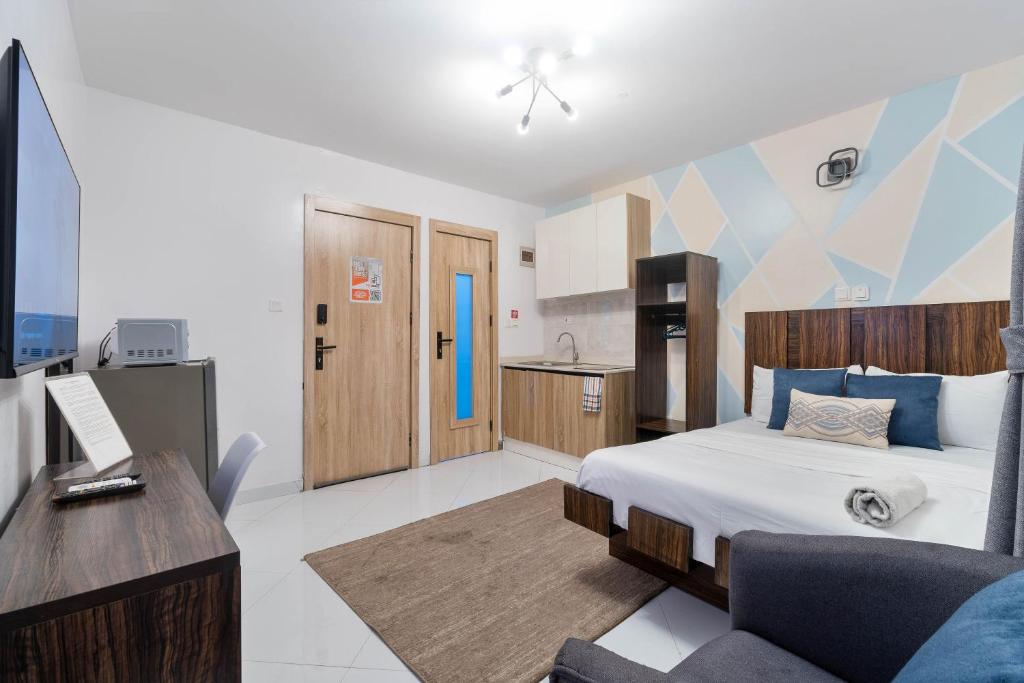 Sigma Base Apartmentsにあるベッド