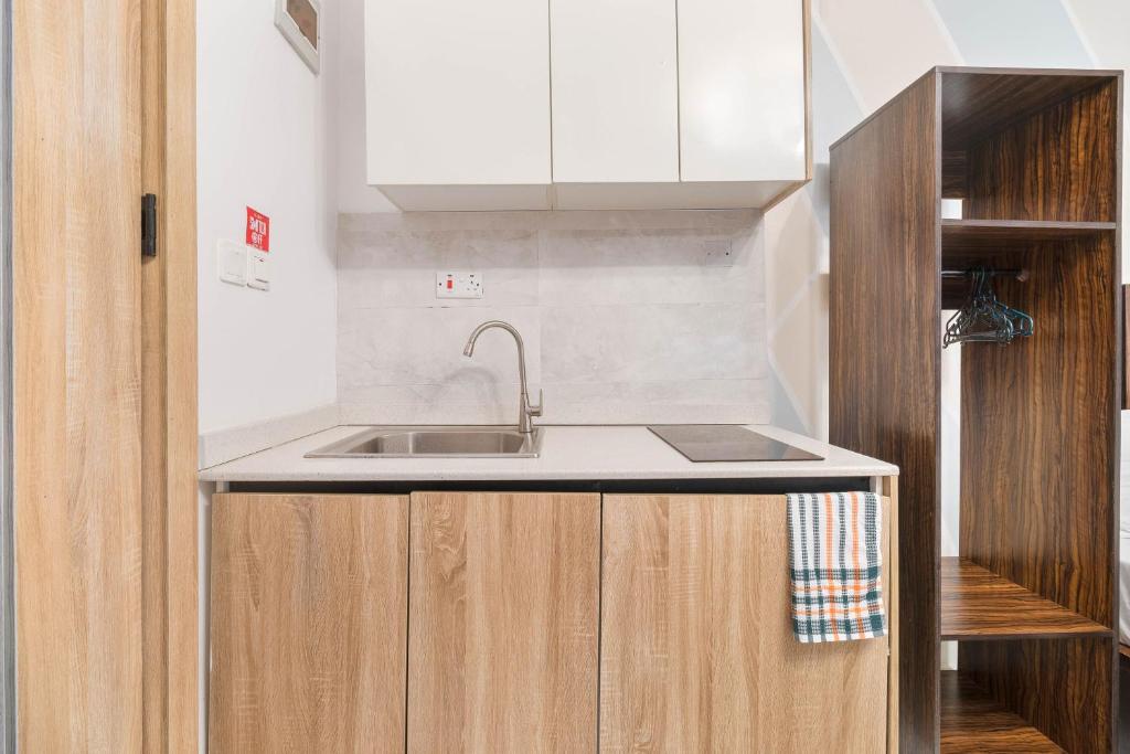 Sigma Base Apartmentsにあるキッチンまたは簡易キッチン