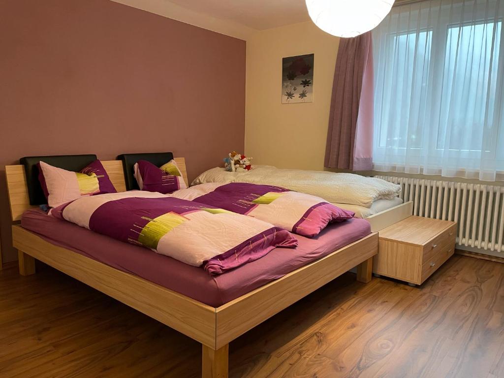 Postel nebo postele na pokoji v ubytování Cresta Loft in Saas-Grund