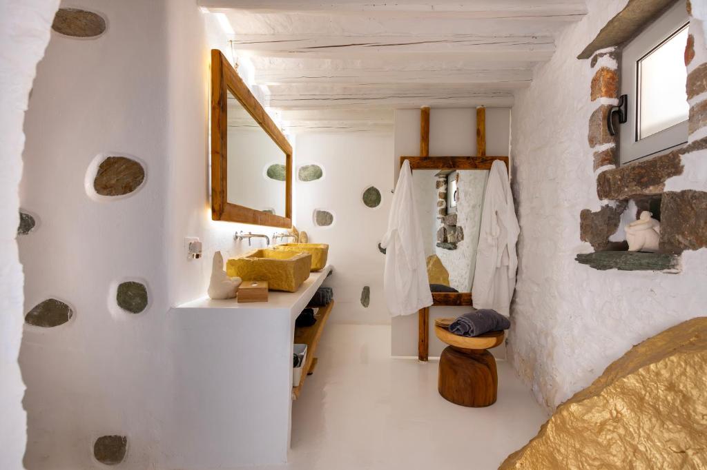 Postel nebo postele na pokoji v ubytování Onar Suites & Villas