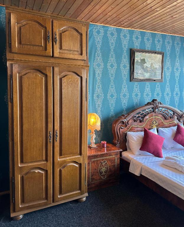 Postel nebo postele na pokoji v ubytování Hotel Odelia