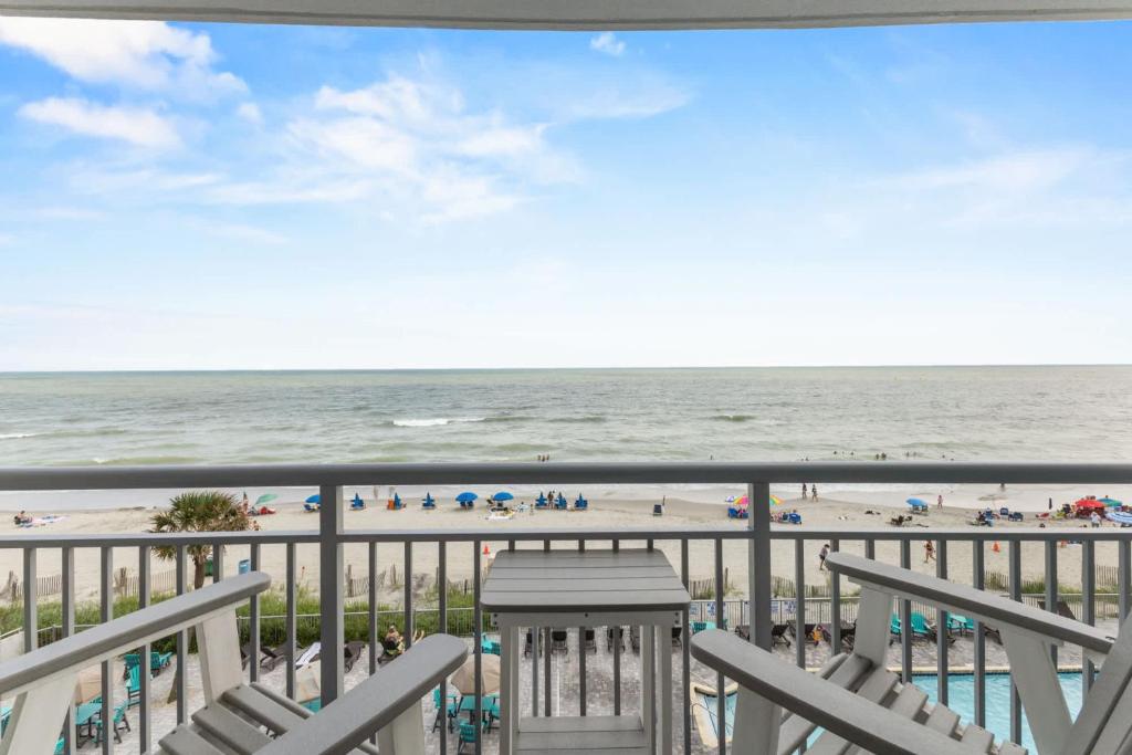 a view of the beach from the balcony at Oceans One Resort Unit 404 - Oceanfront in Myrtle Beach