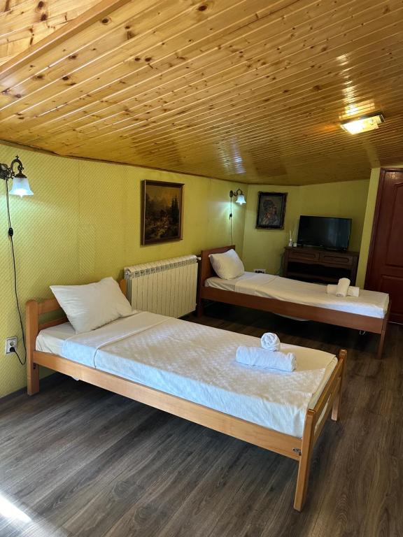 Postel nebo postele na pokoji v ubytování Hotel Odelia