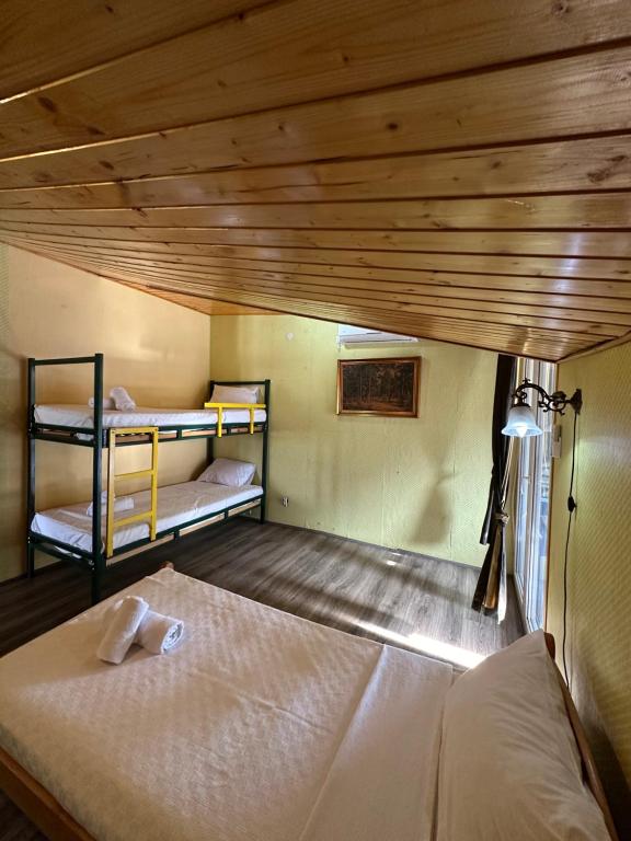 Postel nebo postele na pokoji v ubytování Hotel Odelia