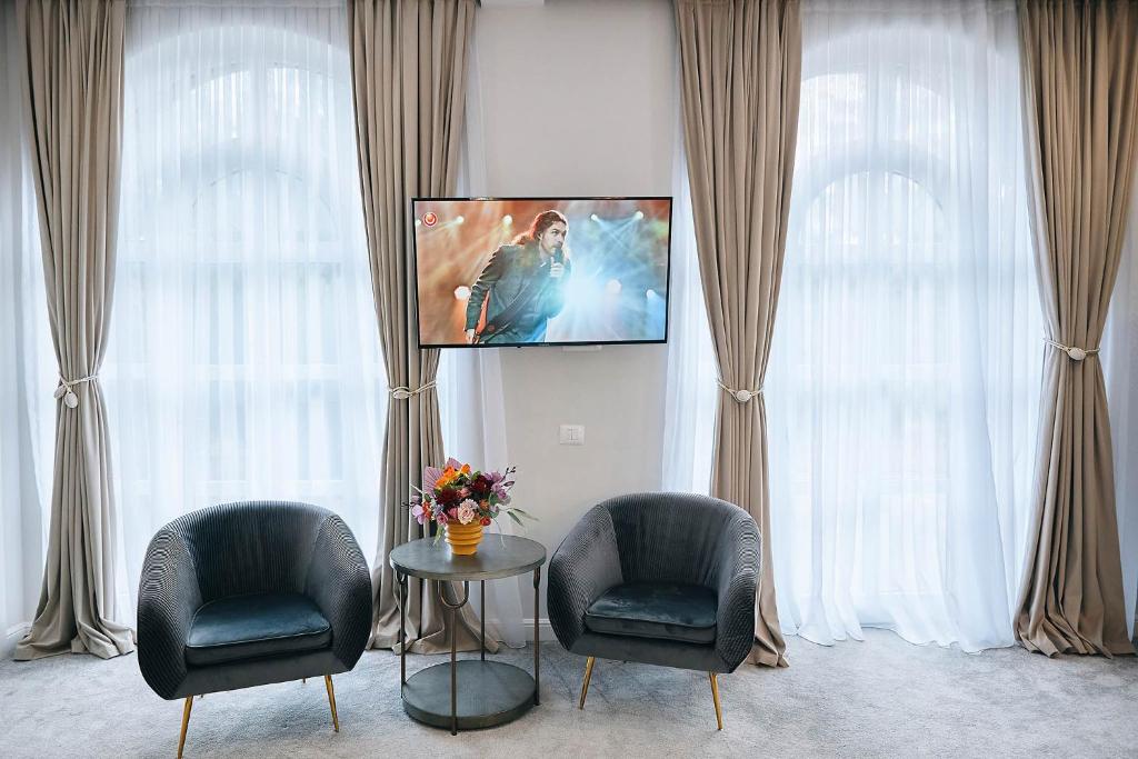 TV a/nebo společenská místnost v ubytování Lacul Verde Resort