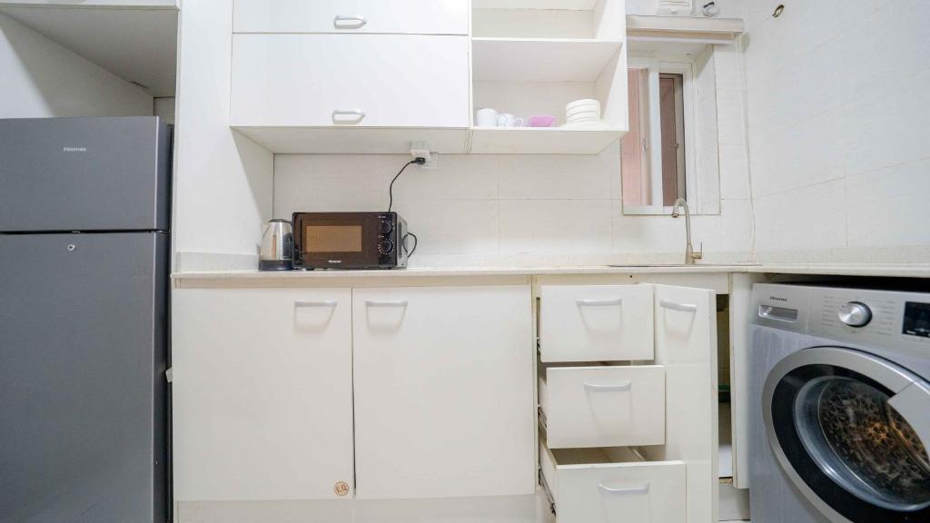 Kuchyň nebo kuchyňský kout v ubytování Lekki FootPrint, Lekki Phase1