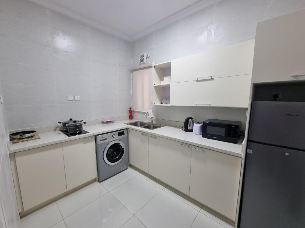 Kuchyň nebo kuchyňský kout v ubytování Lekki FootPrint, Lekki Phase1
