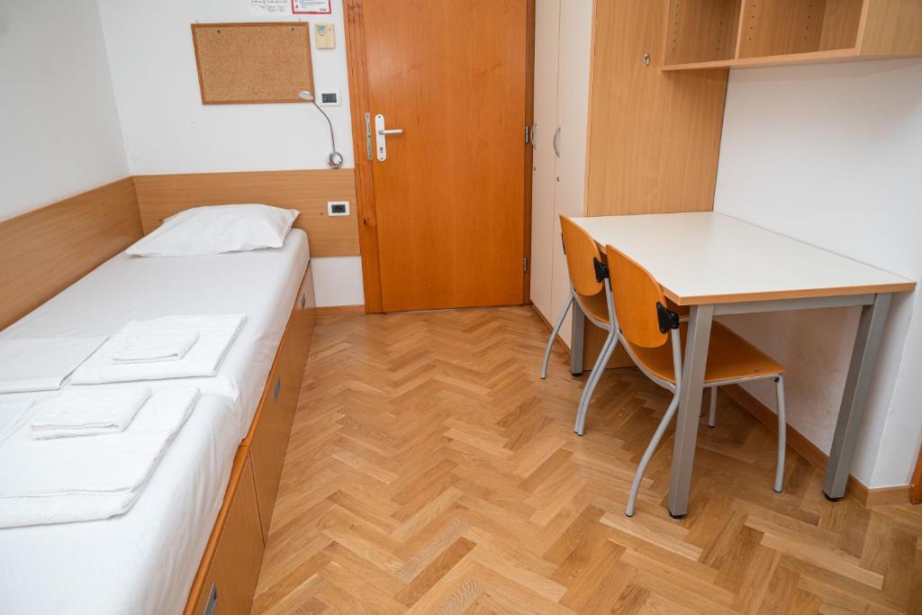 Postel nebo postele na pokoji v ubytování Hostel Sveta Ana
