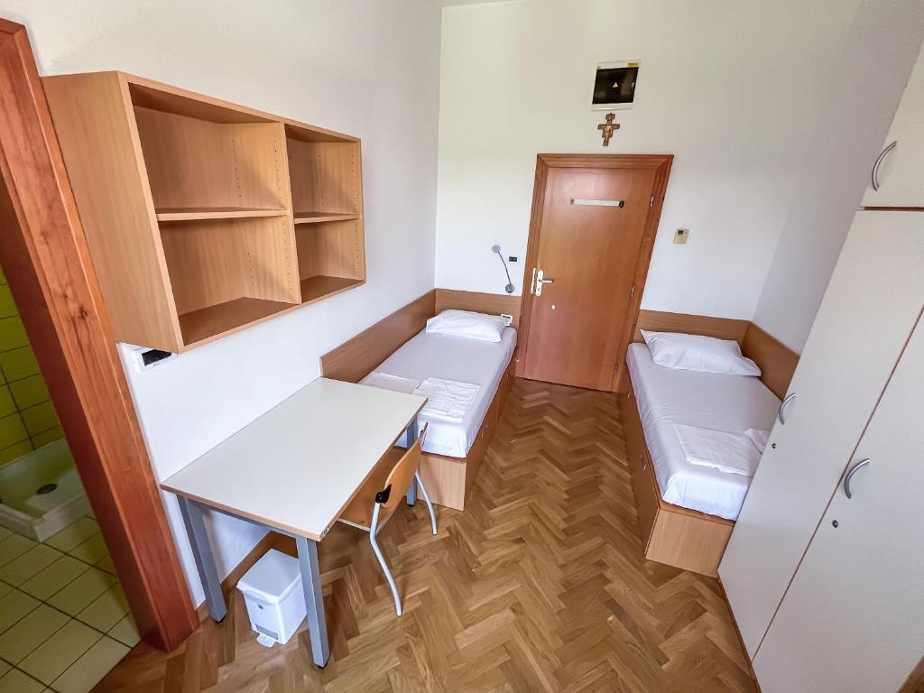 Postel nebo postele na pokoji v ubytování Hostel Sveta Ana