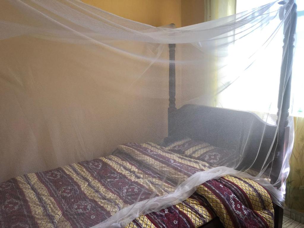 Postel nebo postele na pokoji v ubytování Ereto Mara Paradise Camp