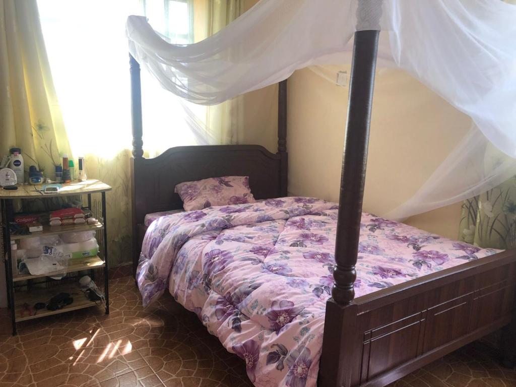 Postel nebo postele na pokoji v ubytování Ereto Mara Paradise Camp
