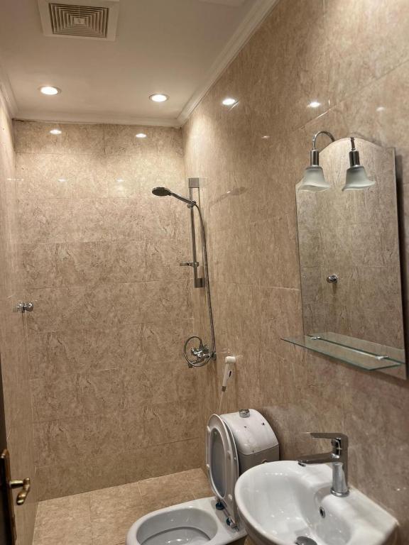 Koupelna v ubytování Al tawfeeg hotel - Al Azizyah