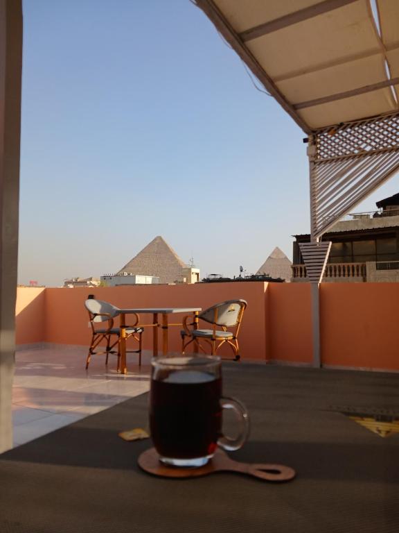 Balkón nebo terasa v ubytování Pyramids Way Inn