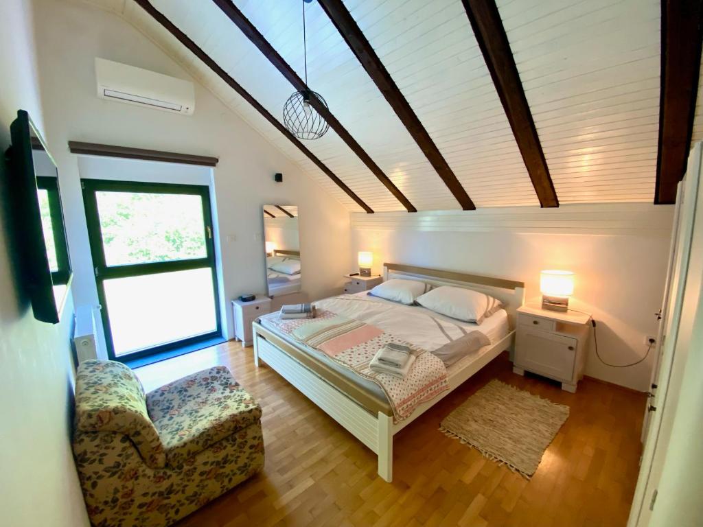 Postel nebo postele na pokoji v ubytování Villa Colapis