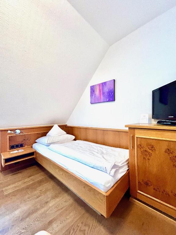 TV a/nebo společenská místnost v ubytování Hotel Fischerhaus