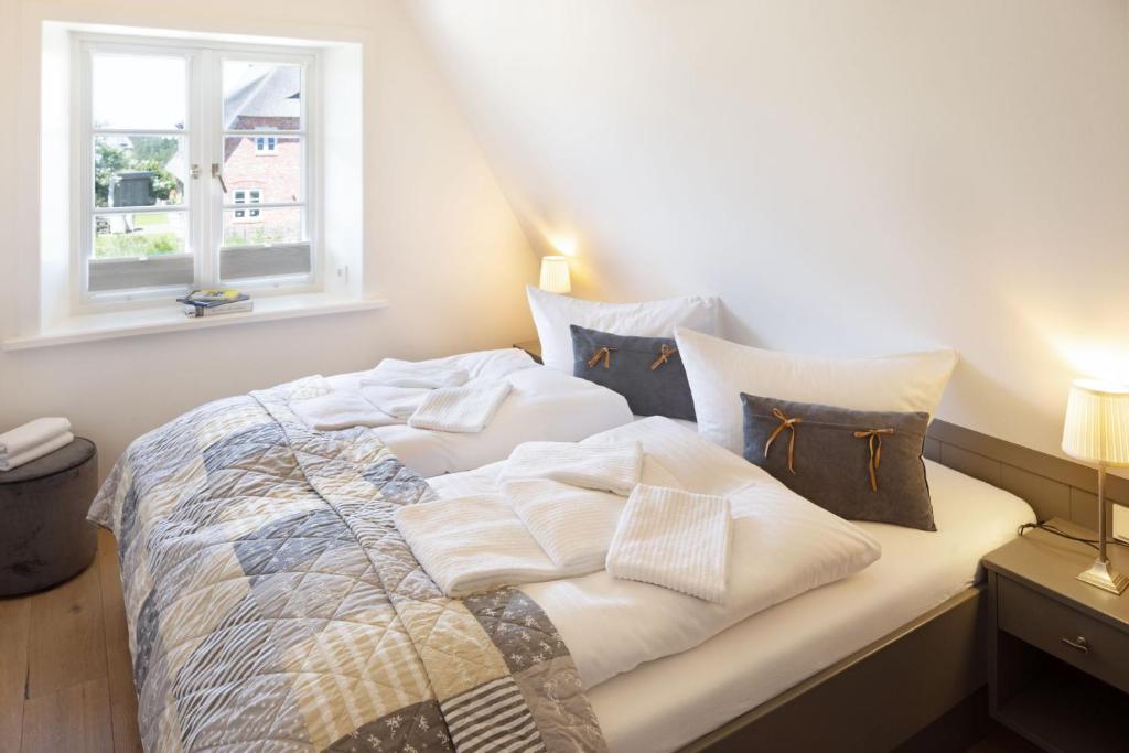 Postel nebo postele na pokoji v ubytování Ausblick - Jonna