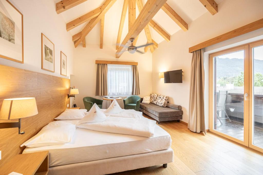 Posteľ alebo postele v izbe v ubytovaní Parkhotel Tirolerhof