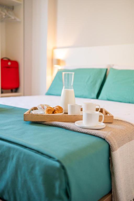 Postel nebo postele na pokoji v ubytování Letizia B&B