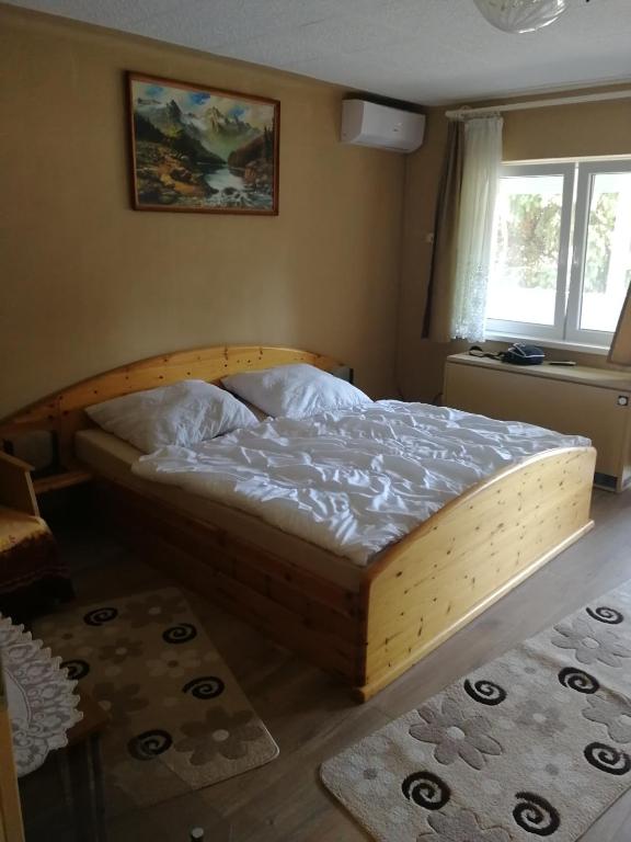 Posteľ alebo postele v izbe v ubytovaní Merkl Apartman- Harkány