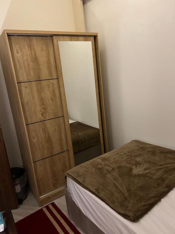 Un pat sau paturi într-o cameră la Matto Pyramids Inn