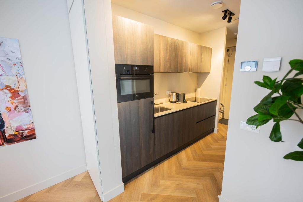 Kuchyň nebo kuchyňský kout v ubytování Kerkstraat
