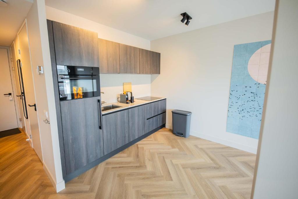 Kuchyň nebo kuchyňský kout v ubytování Kerkstraat