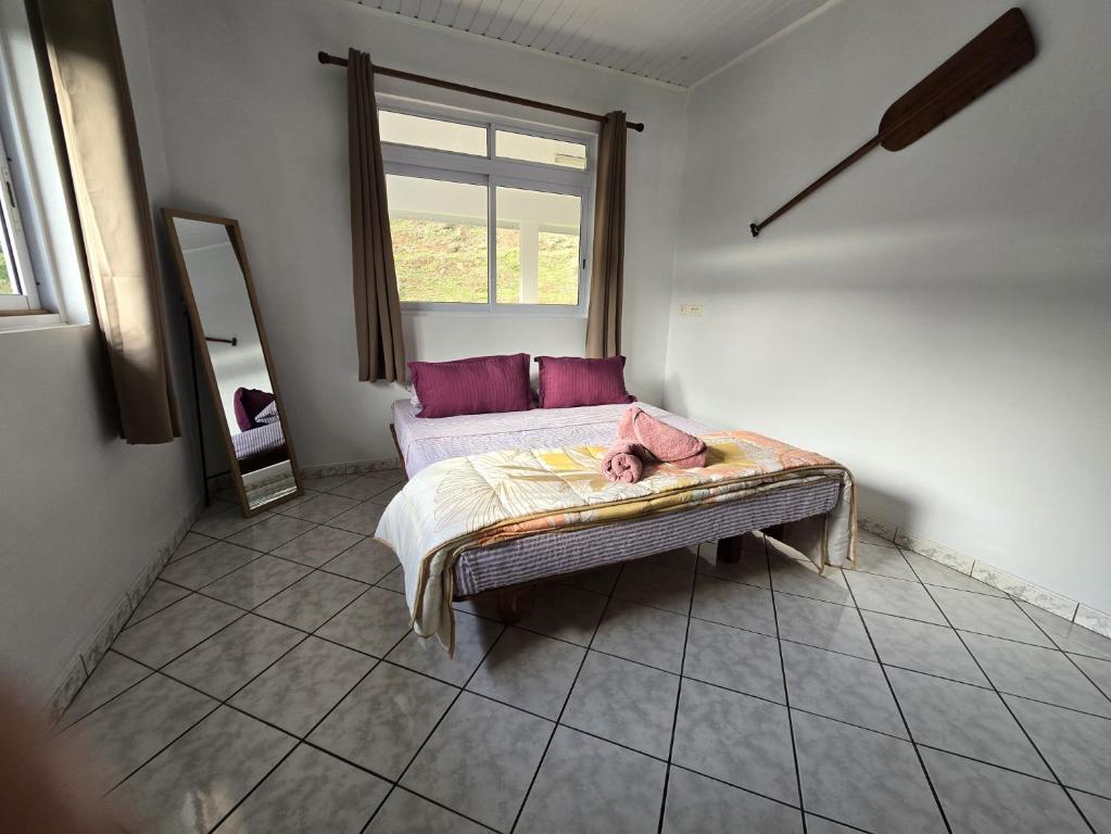 Postel nebo postele na pokoji v ubytování Noha Lodge