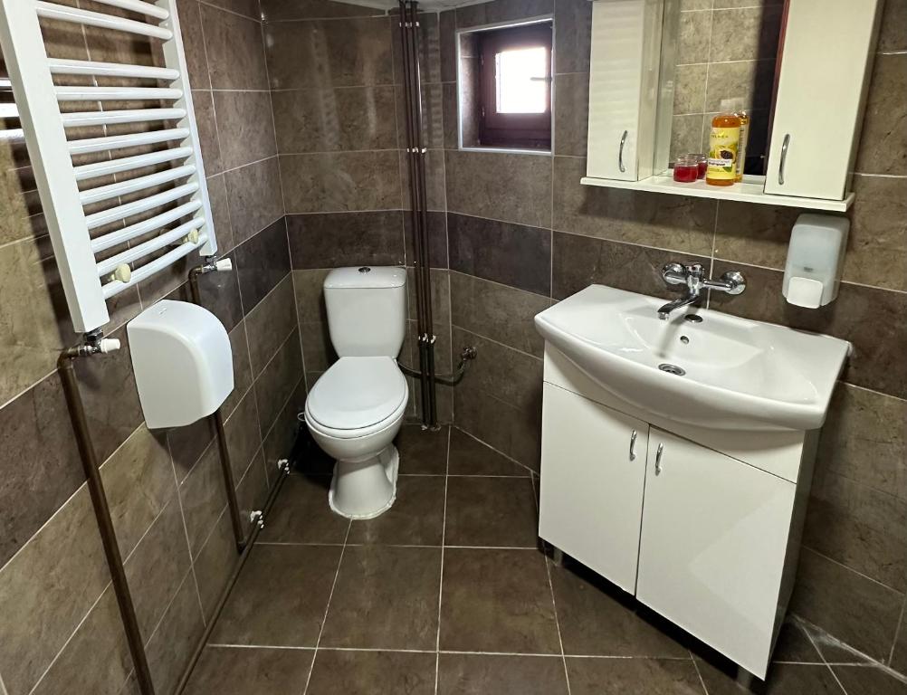 Koupelna v ubytování Hotel Odelia