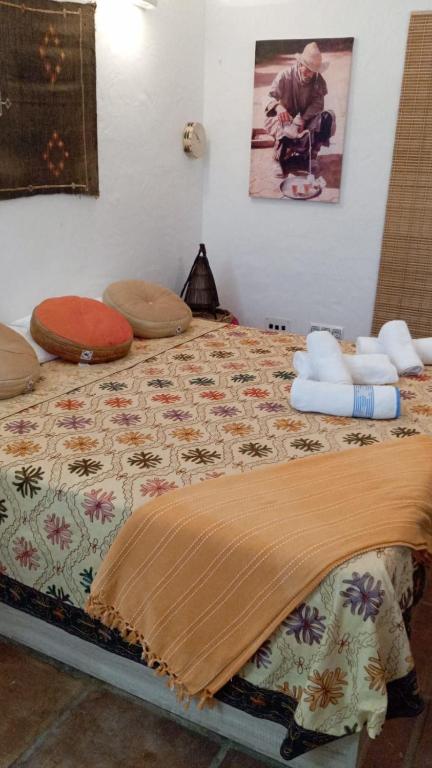 Postel nebo postele na pokoji v ubytování Cuarto encantador rústico