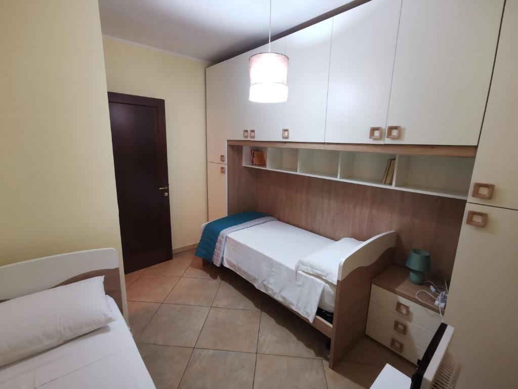 Postel nebo postele na pokoji v ubytování Casa Vitina